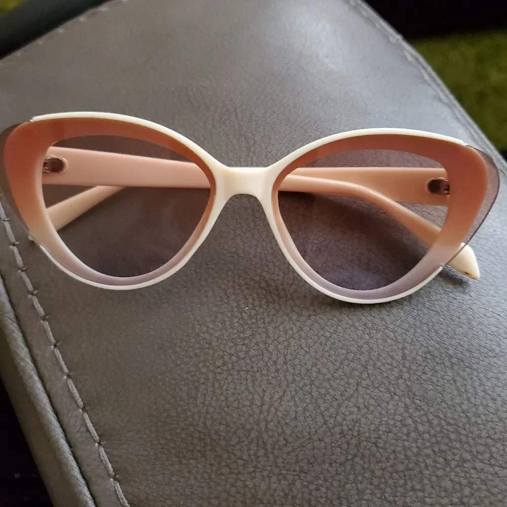 Small adult or child Beige sun glasses. New and never worn